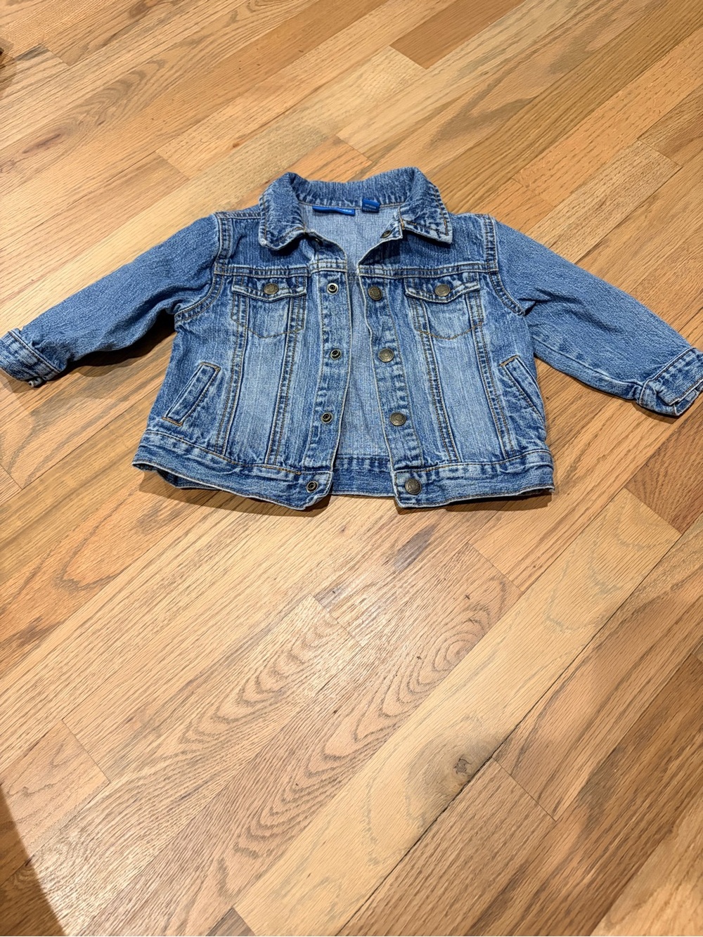 Baby girl denim jacket with snap closure